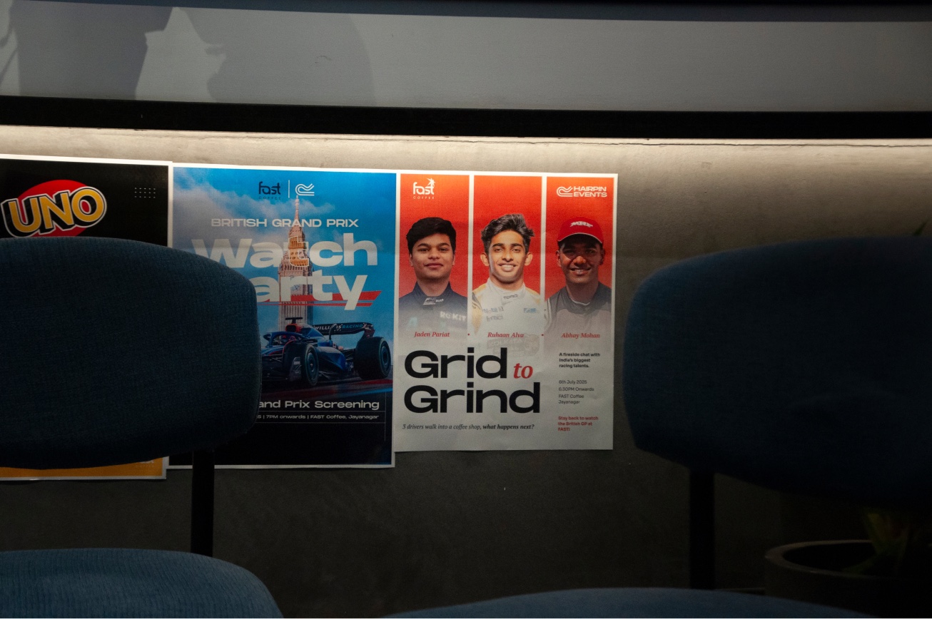 Grid to Grind posters installed behind chairs at the venue.